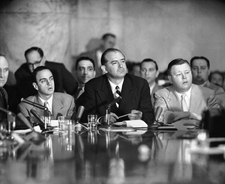 How many communists did Senator Joseph McCarthy say he found in the State Department?