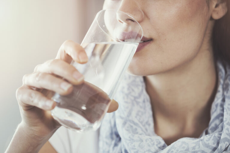 How much of America drinks fluoridated water?