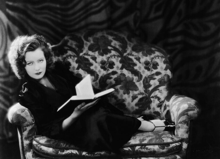 How old was Greta Garbo when she retired from the movie business?