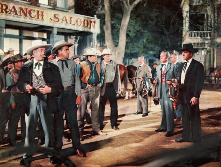 In what town did the gunfight at the O.K. Corral take place, and who was shot?