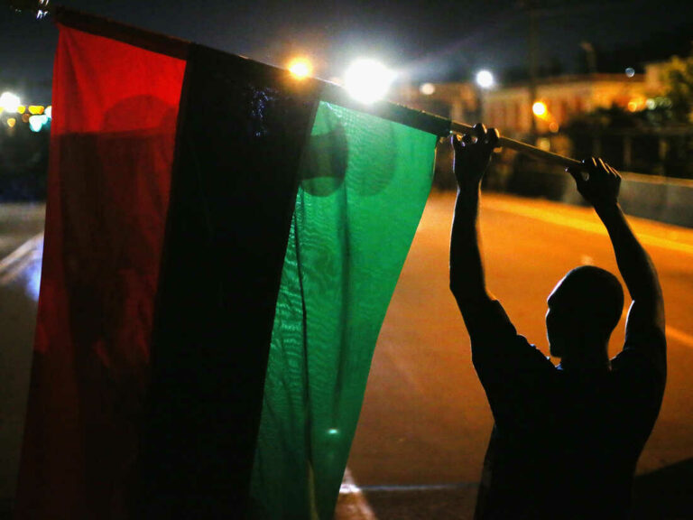 What do the colors of the black liberation flag stand for?