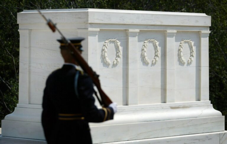 What is the inscription on the Tomb of the Unknown Soldier in Arlington National Cemetery?