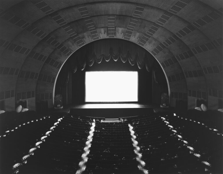What were the first and last regular showings of movies in Radio City Music Hall?