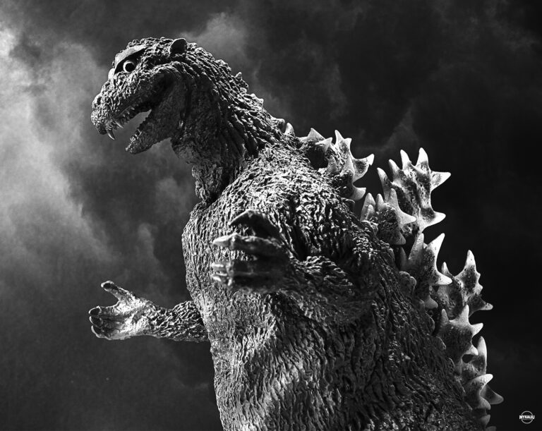 Who designed the title character in Godzilla (1954)?