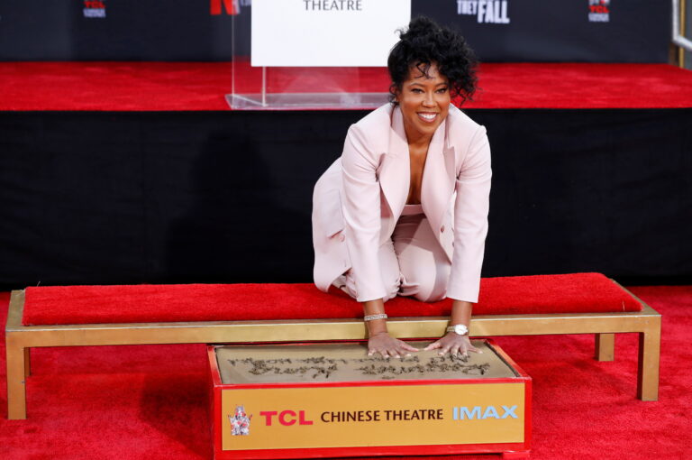 Who was the first Hollywood star to place their footprints at Grauman’s Chinese Theatre?